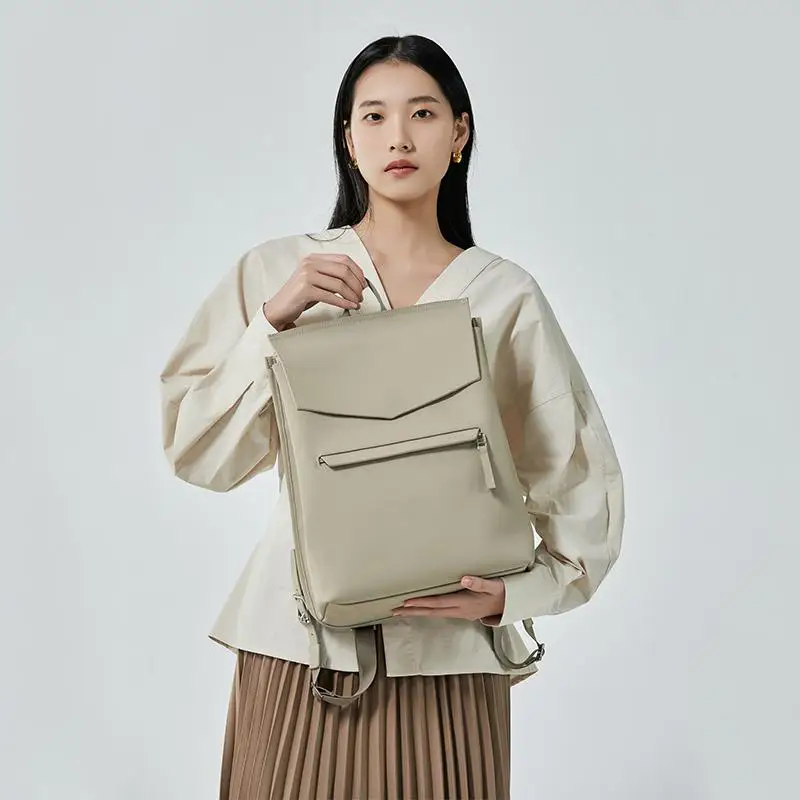 حقيبة ظهر عصرية جديدة يابانية وكورية بسيطة غير رسمية متعددة الاستخدامات للعمل والتنقل بتصميم فاخر خفيف حقيبة سيدات الأعمال العصرية