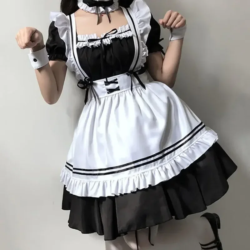 Cosplay ragazza carina Costume nero bianco grembiule vestito Lolita vestito Anime gonna lunga Cafe Costume Cosplay muslimama