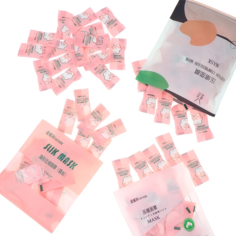 Maschera per il viso compressa monouso Candy 20/50/100 pezzi Maschera per il viso Asciugamano per il viso Tessuti avvolti con monete Carta per la cura della pelle Seta/Cotone