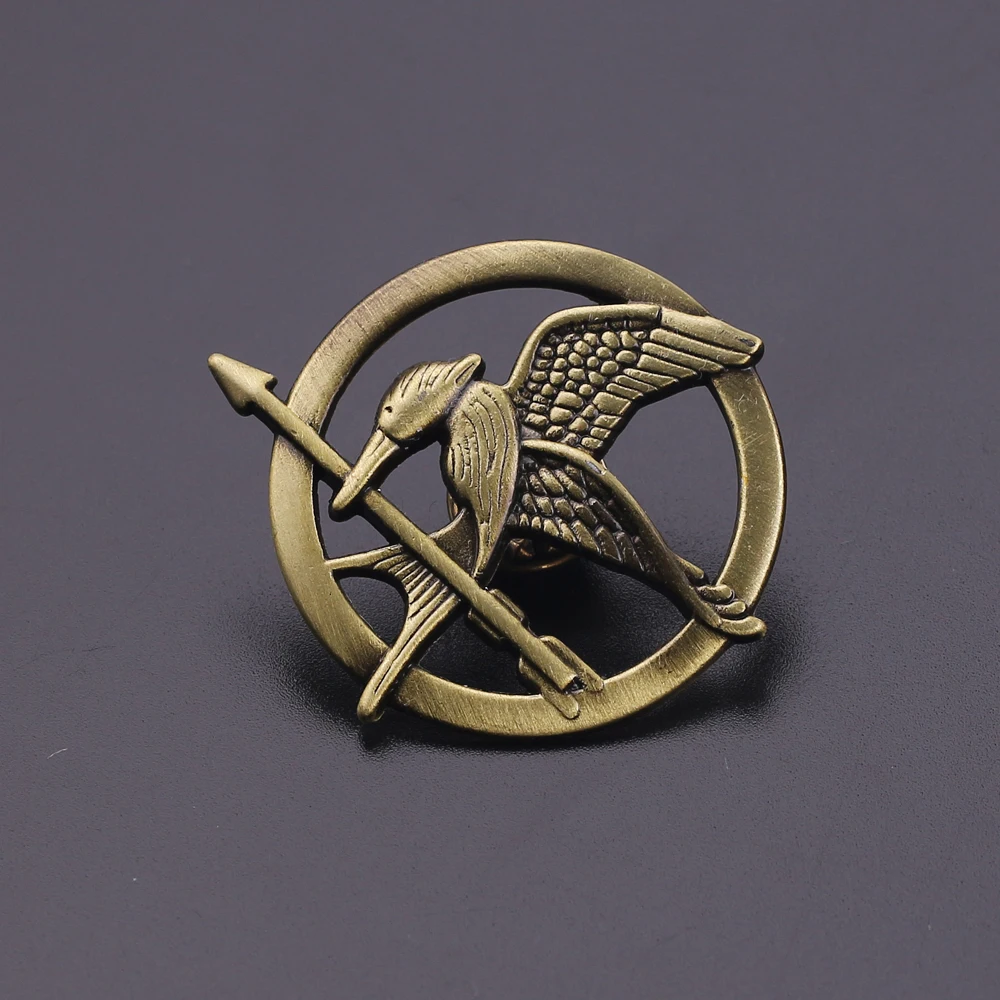 The Hunger Game Movie Brooches Jewelry Mockingjay Metal Button Badges for Handbag Cap Clothing Lapel Pins Accessories Toys Gifts