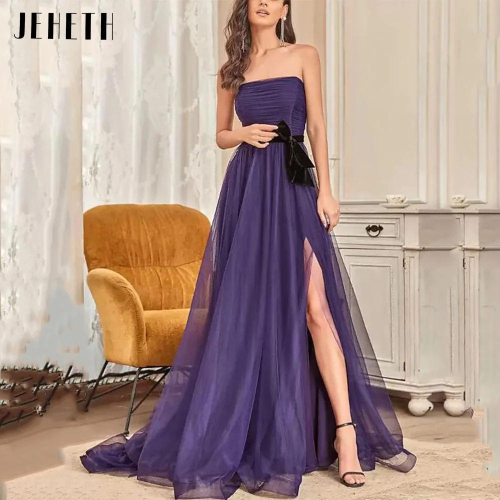 JEHETH Viola Elegante A-Line Sera Abiti formali senza spaJEHETH viola elegante a-line abiti da cerimonia da sera senza spalline in Tulle con spacco laterale senza spalline con nastro nero abito da ballo increspato 2023