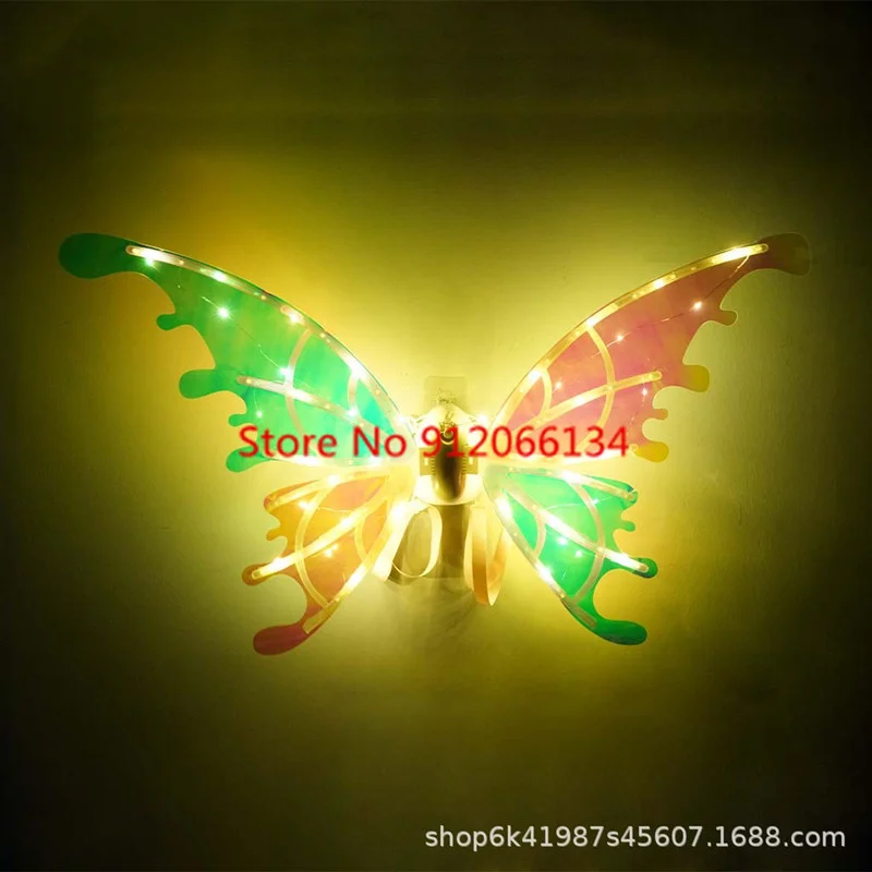 محاكاة فراشة الكهربائية الملونة الإضاءة الجنية الجناح ABS مظهر رائع الموسيقى الجناح مرحلة الأداء الدعائم لعبة أطفال