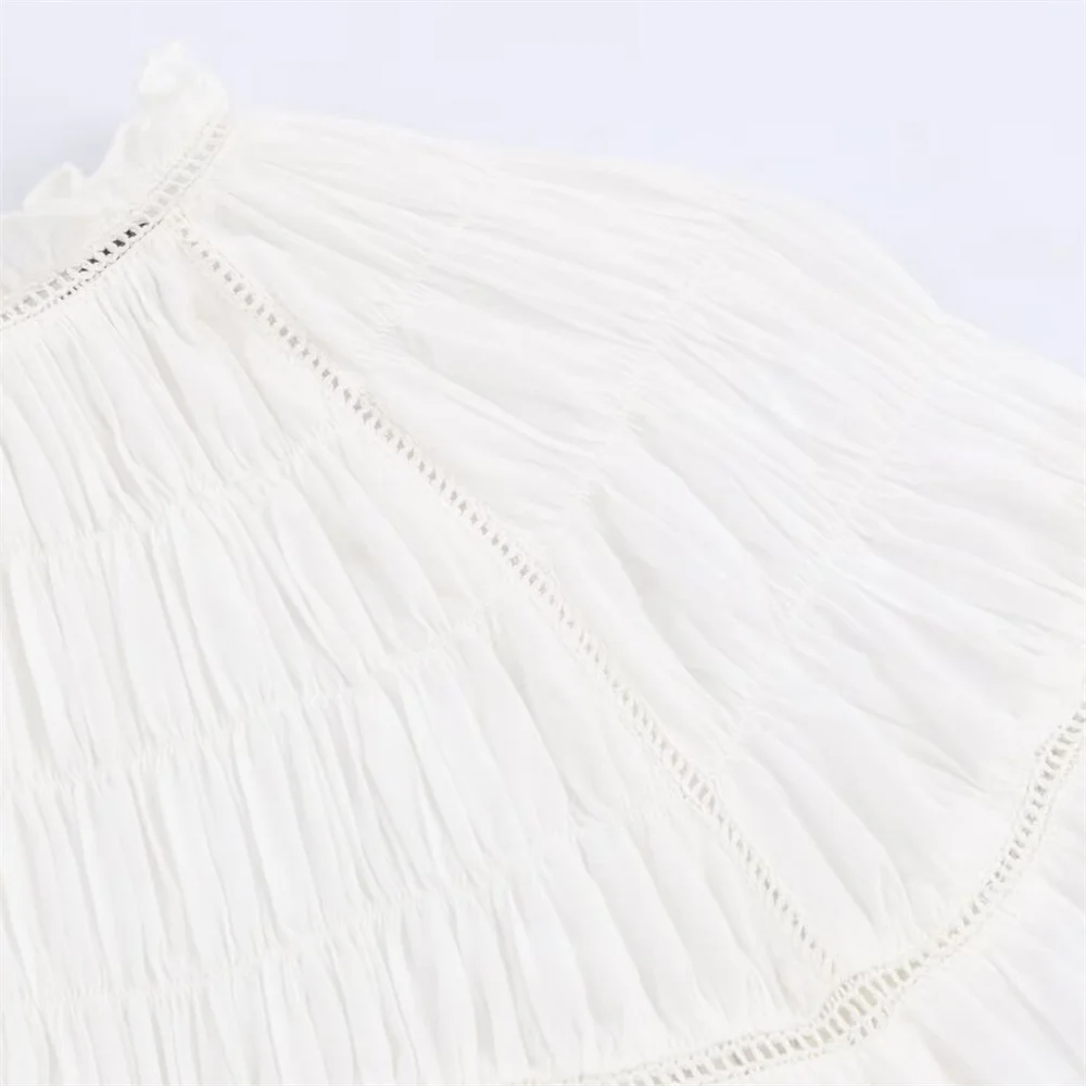 Abbigliamento invernale da donna nuovo temperamento casual semplice camicia a maniche lunghe in stile romantico a nido d'ape