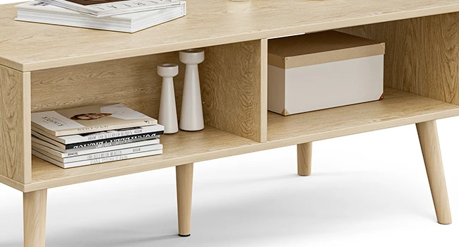 Compact oak coffee table in small living room setting