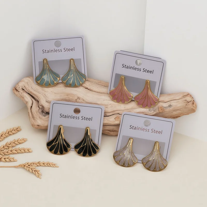 Purchase the charming ginkgo leaf geometric fan-shaped stainless steel earrings, stud earrings, gold fashionable design, retro e
