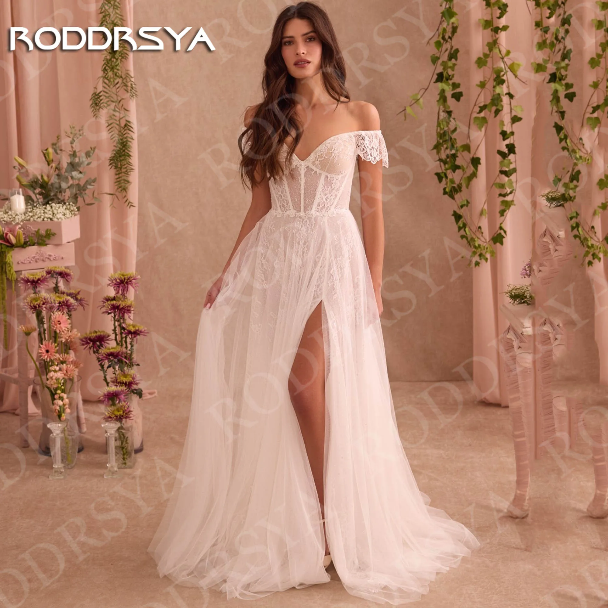 

Свадебное платье RODDRSYA в богемном романтическом стиле пляжное кружевное из тюля с вырезом сердечко с открытыми плечами А-силуэт с высоким разрезом на заказ Богемские романтические свадебные платья пляжное кружево тю