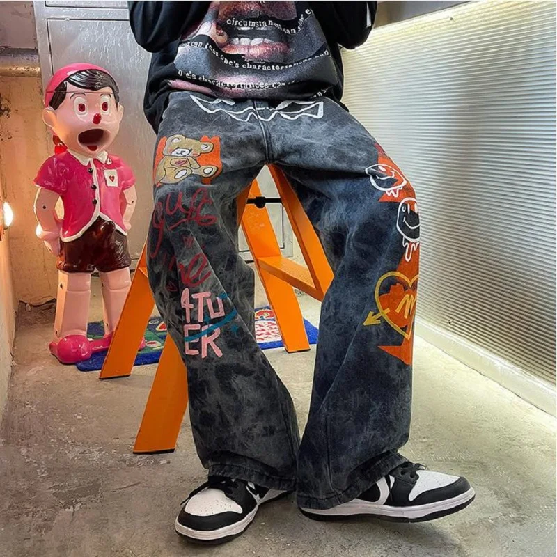 

American Autumn Fried Street Pants High Street Ins Hip Hop Graffiti Jeans Design Sense Loose Straight Pants Men And Women Trend