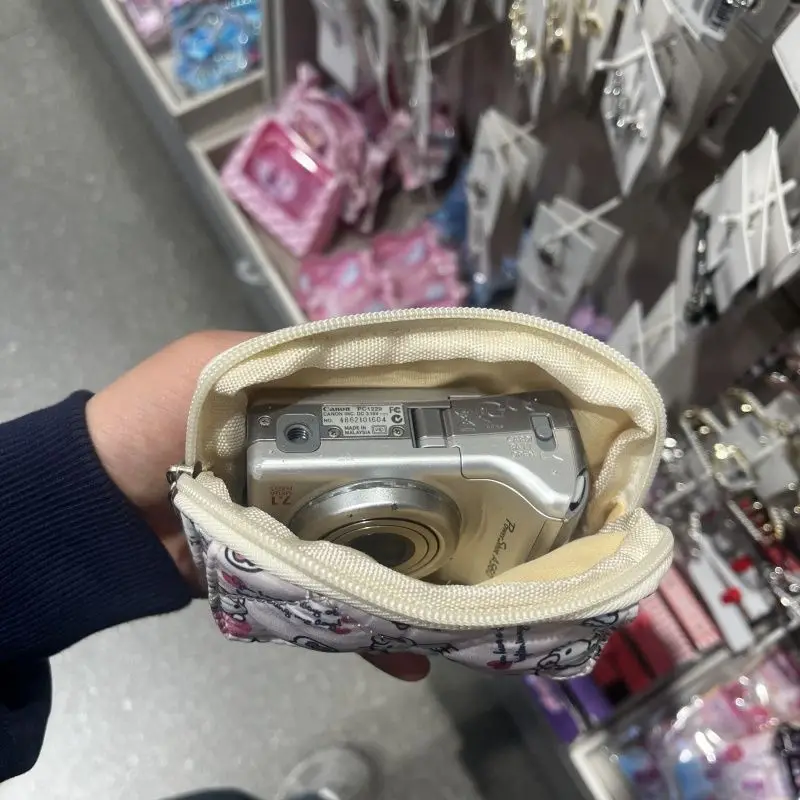 Originele 2025 Nieuwe Sanrio Hello Kitty Kleine Kaart Tas Cartoon Kitty Kat Joker Portemonnee Oortelefoon Sleutel Tas CCD Opbergzakken