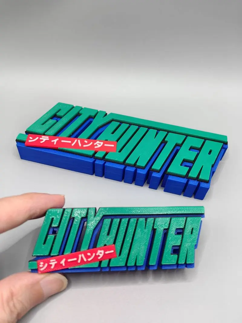 ป้ายโลโก้ 3 มิติ แบบพิมพ์ สำหรับโมเดลตัวละครอนิเมะ City Hunter ซึ่งเป็นตัวละครของ Saeba Ryo ใช้สำหรับตั้งโชว์ คอสเพลย์ นิทรรศการ ของสะสม และของเล่น