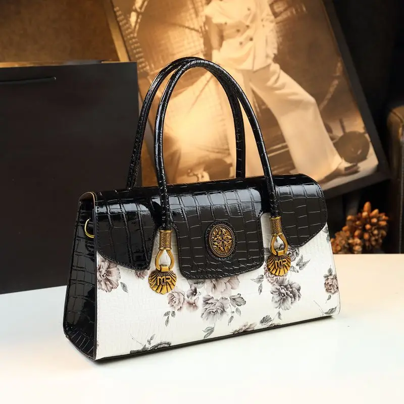 New Chinese leather advanced sense new niche large capacity flower handbag summer fashion mother bag