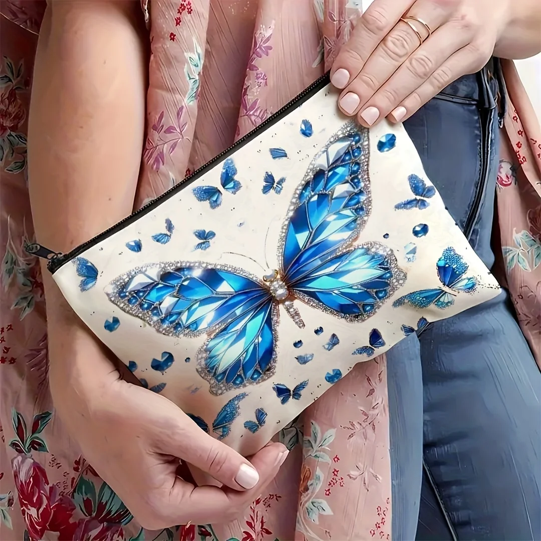 Un sac de maquillage papillon bleu – Sac à fermeture éclair multifonctionnel mignon pour femmes, sac de rangement de bijoux