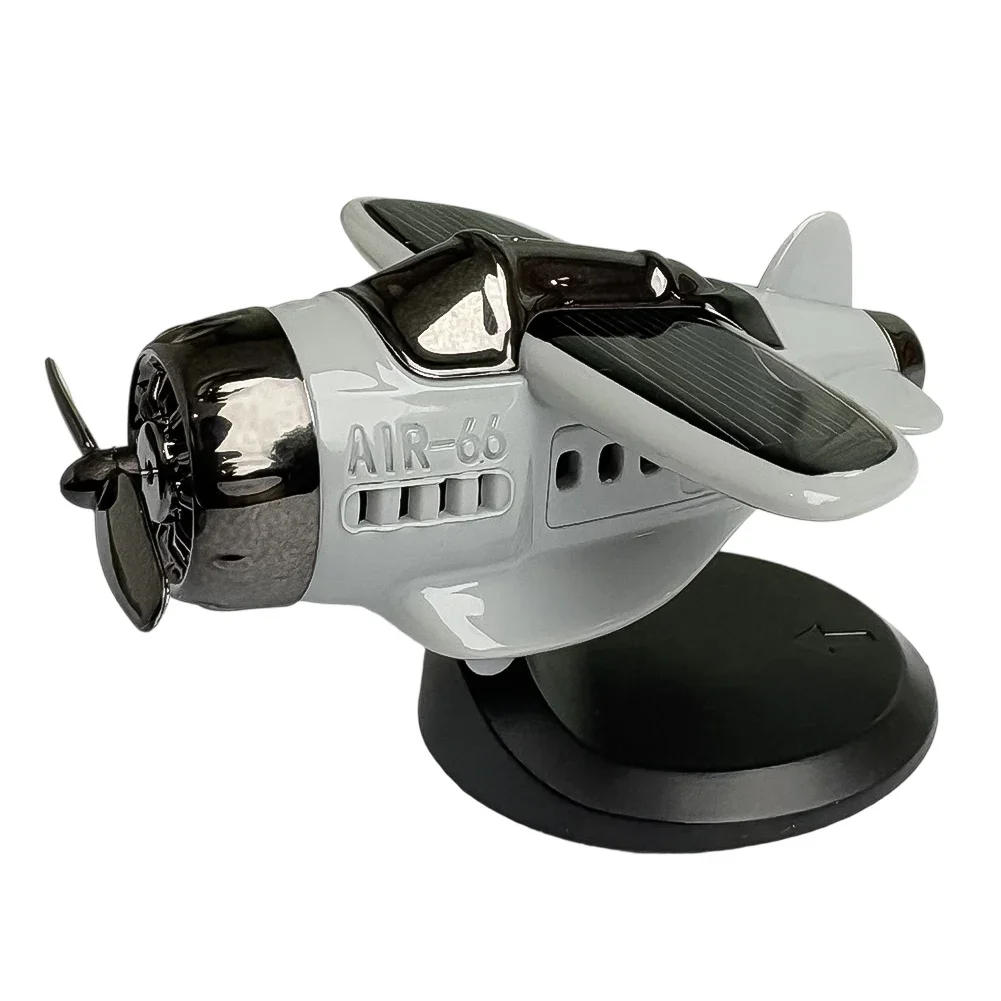 Solar Powered Rotating Propeller Fighter Car Ornament With Light Activated Movement And Energy Collection For Vehicle Use
