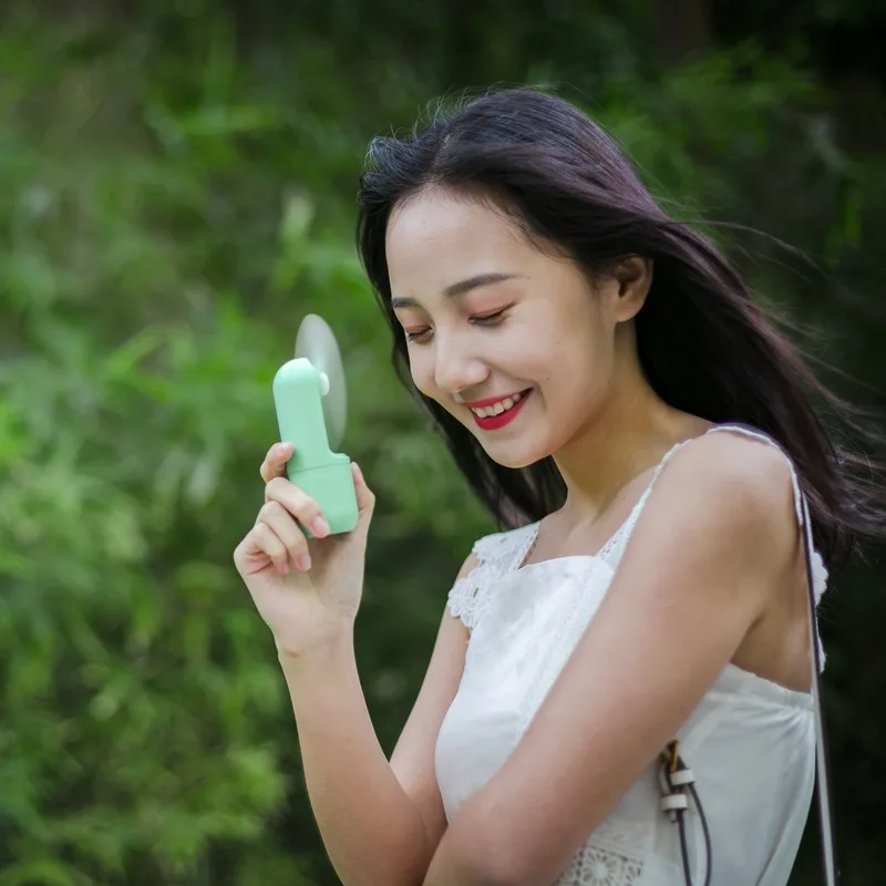 Capsule Mini Fan Ultra-Compact Design Foldable Blades Two Speed Settings Smart One-Touch Stop Large Battery Capacity