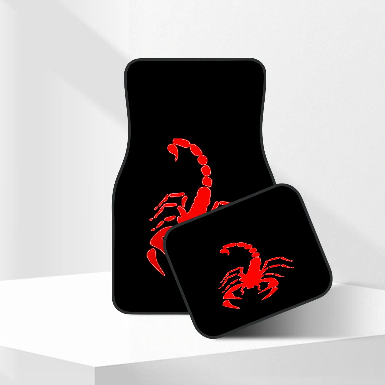 A Collection Of Four Scorpion-Themed Car Mats, Designed For Both Front And Rear Seating Areas, Made From Washable Polyester To E