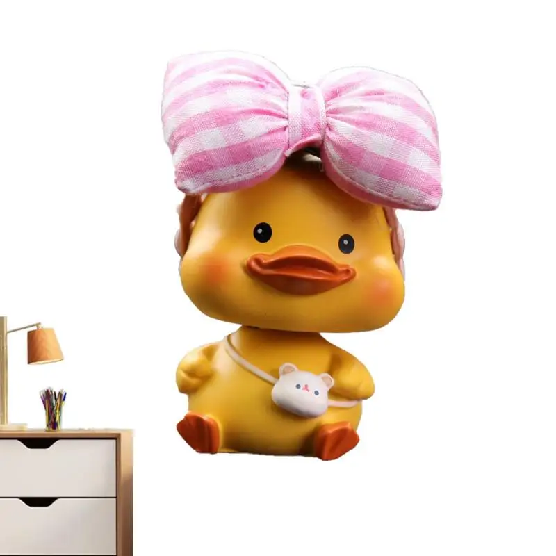 Dashboard Duck Figu…