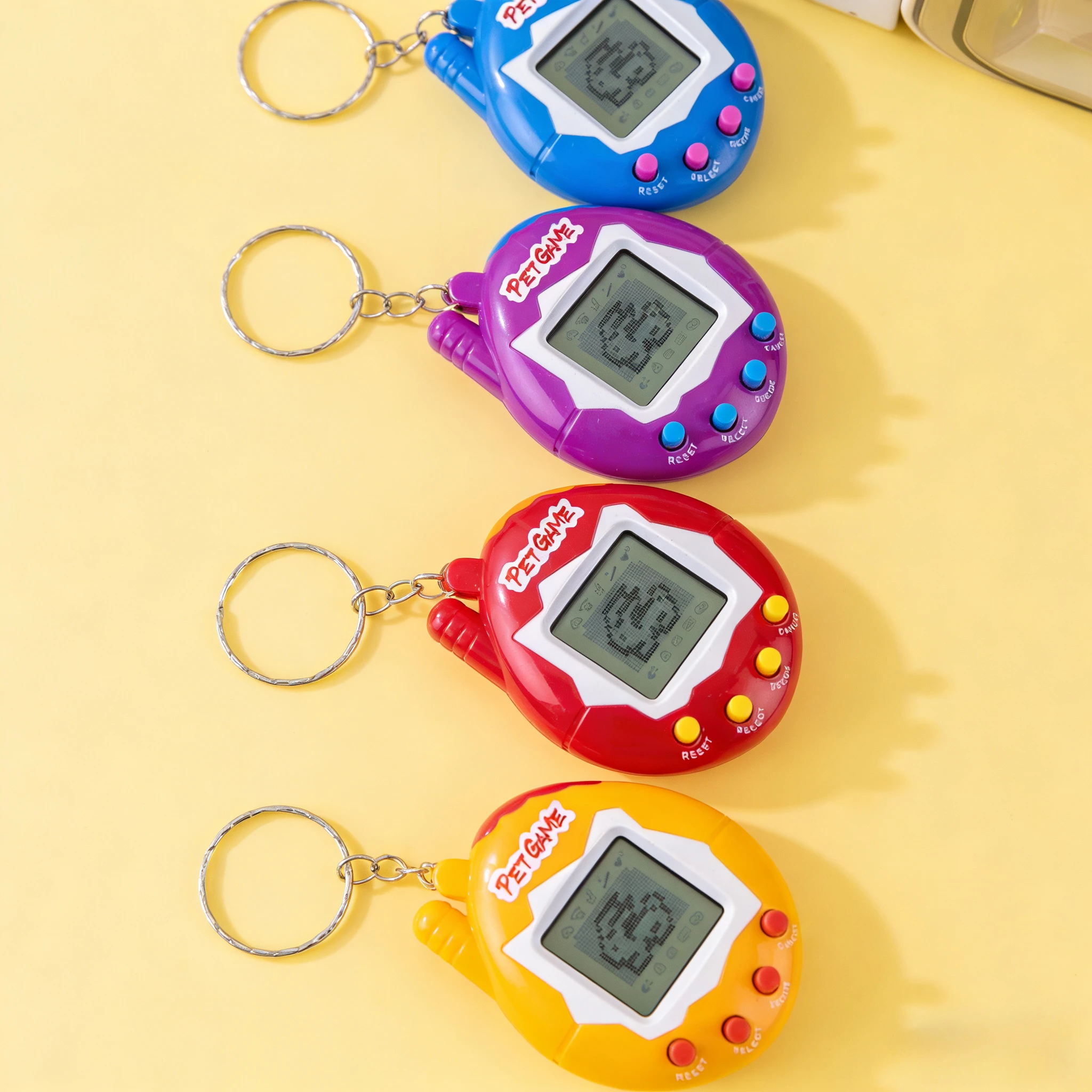 สัตว์เลี้ยงอิเล็กทรอนิกส์แบบใส 1 ชิ้น/2 ชิ้น ทามาก็อตจิ สัตว์เลี้ยงย้อนยุคในหนึ่งเดียว ของเล่นดิจิทัลเสมือนจริง สัตว์เลี้ยงย้อนยุคสุดฮา ของเล่นพิกเซลสุดสนุก