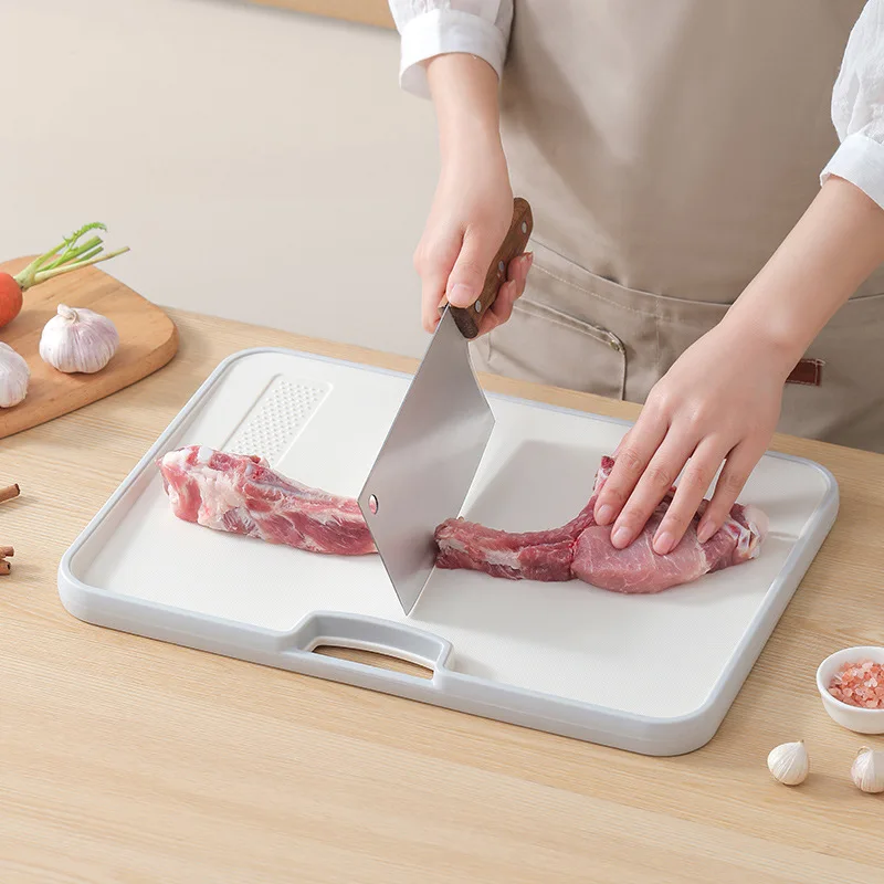 Creative plastic anti slip double-sided cutting board
