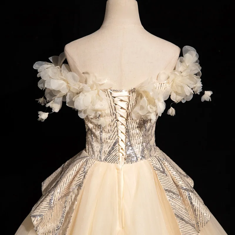 2025 Neues Damen-Sommerkleid mit Champagner-Mesh-Stickerei und einer Schulter, modisches und süßes Bankett-Anhänger-Puffrock