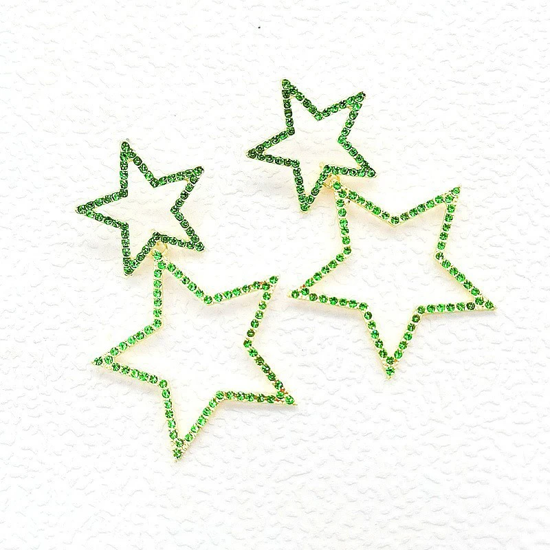 A piece of sexy and fashionable rhinestone earrings/hollow five-pointed star earrings for ladies to wear on holiday and for dail