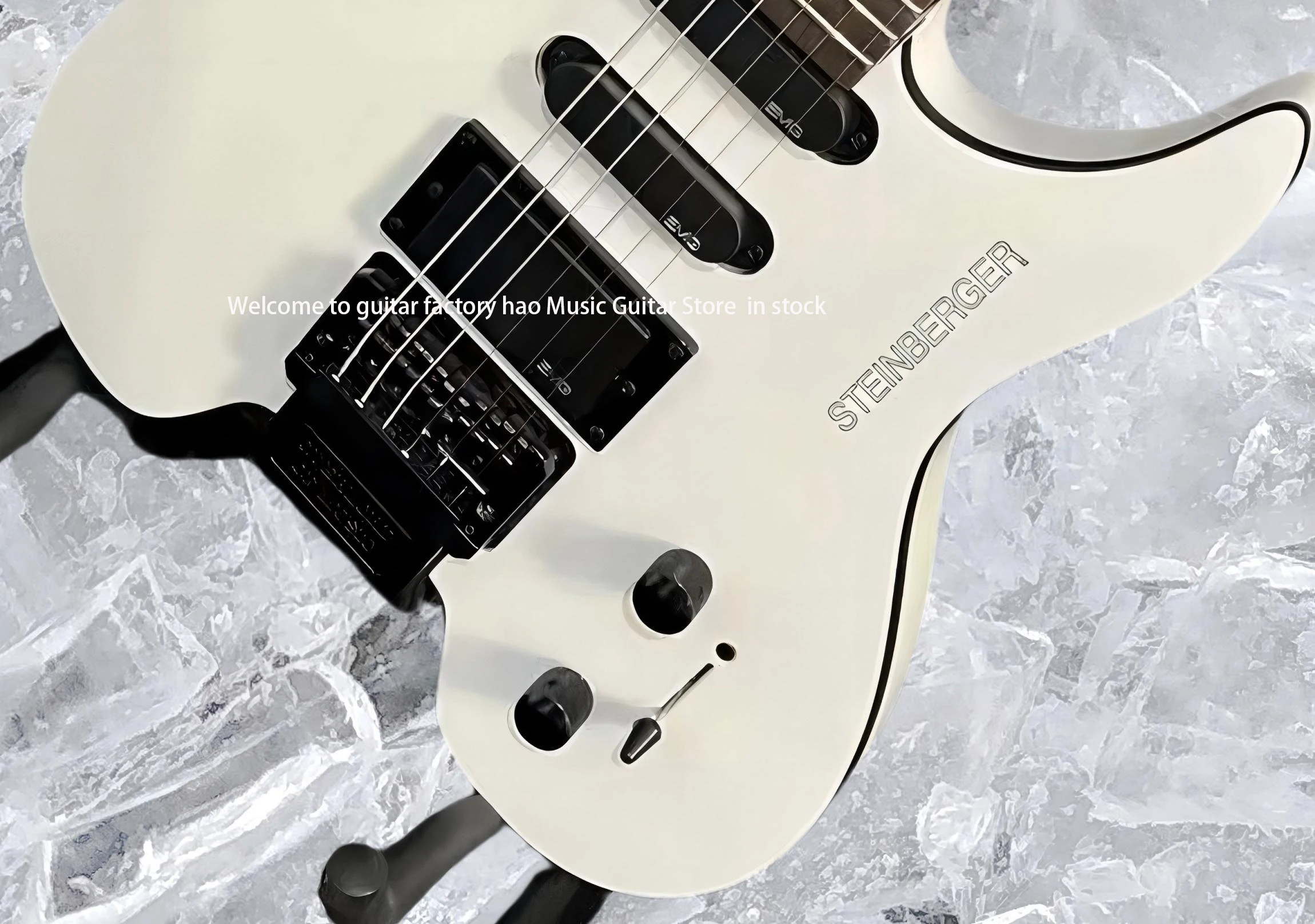 جيتار كهربائي بدون رأس، جسم الماهوجني، جسر فلويد روز تريمولو، جيتار مكون من 6 أوتار، إصدار شتاينبرغ