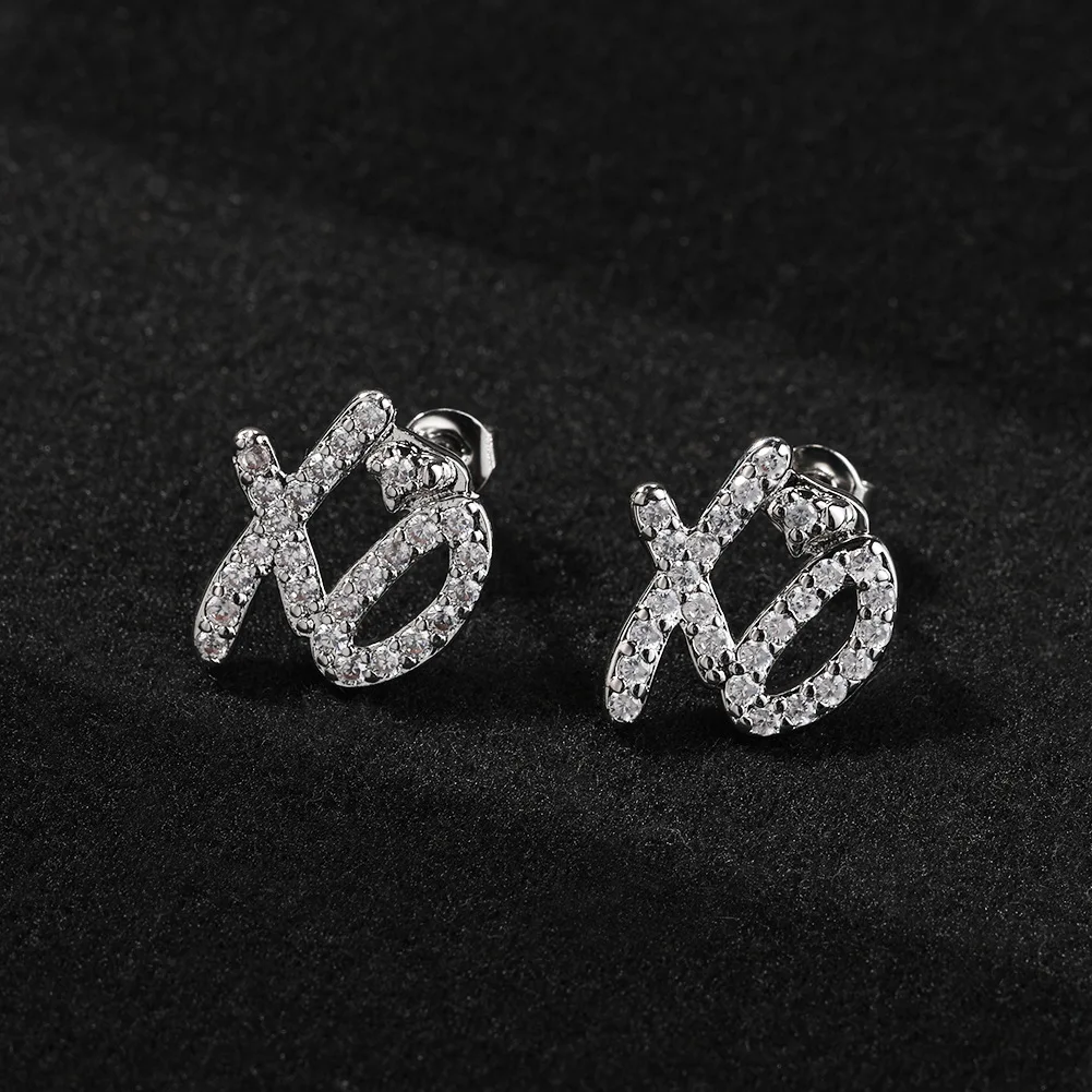 Unisex Iced out XO Heart Stud Earrings with Cubic Zirconia Hip Hop Jewelry Fashionable And Stylish Accessory for Men And Women