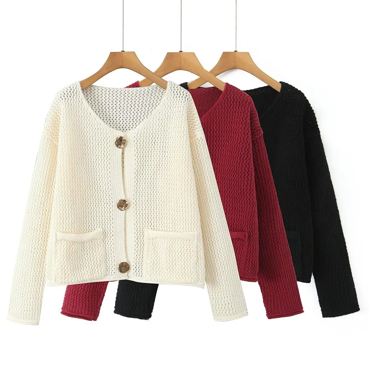 

Chunky knit cardigan with metal buttons. Cozy, chic & versatile for effortless style.