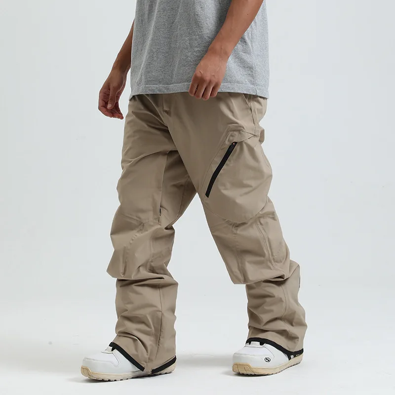 

Снежные ветрозащитные лыжные штаны, мягкие зимние однотонные спортивные штаны на открытом воздухе для мужчин и женщин с эластичной резинкой на талии, водонепроницаемые теплые брюки для сноуборда