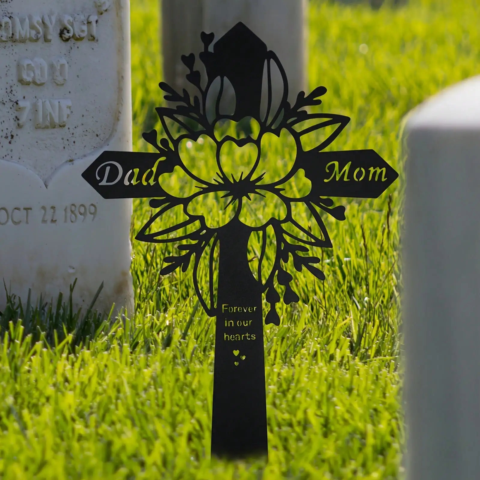 Cross ironwork outdoor plaque decoration for memorial stake in front of parents' grave