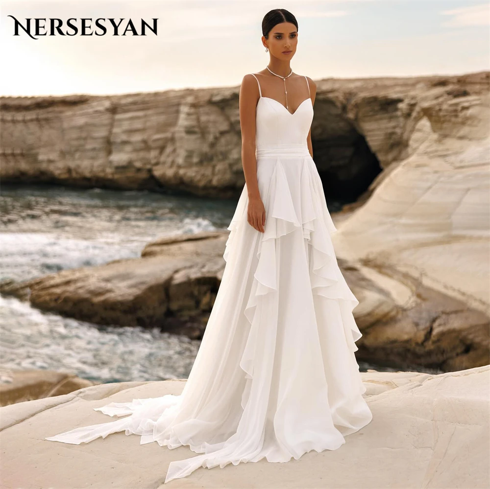 

Nersesyan Solid Elegant Wedding Dresses Ruffles Spaghetti Straps A-Line V-Neck Bridal Gowns Backless Sleeveless Bride Dress 2024