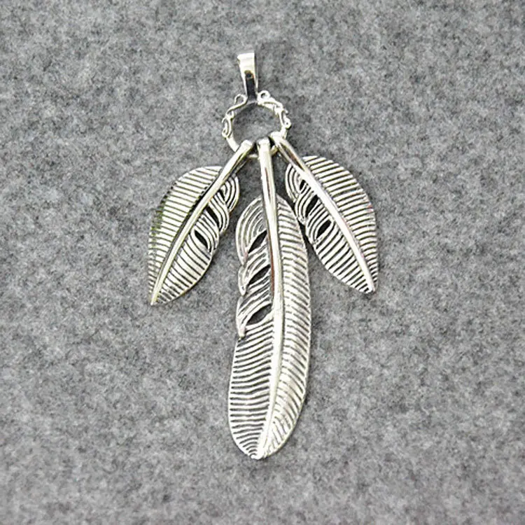 

Japanese trendsetter men and women Thai silver pendant jewelry, pure silver jewelry retro handmade three leaf feather pendant