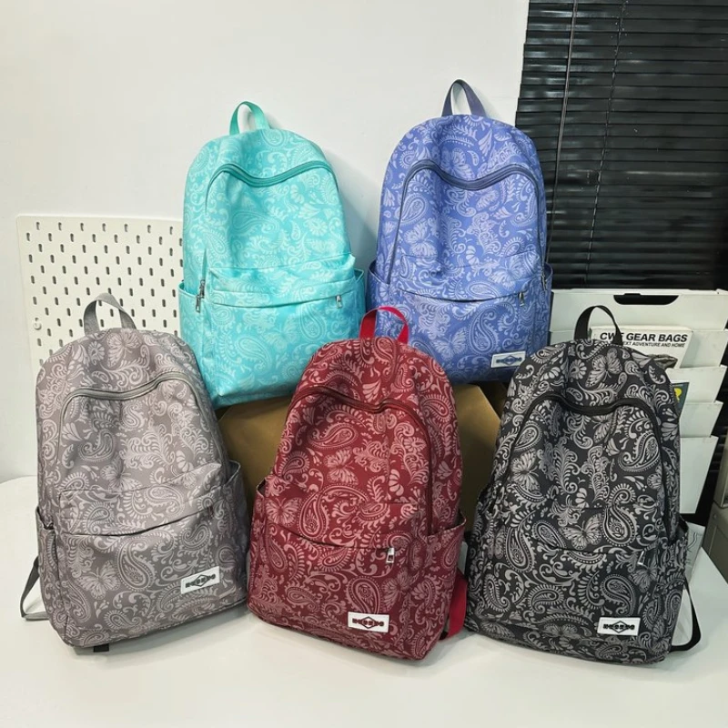 Mochila dulce con estampado personalizado de nailon con cremallera, bolso escolar sencillo e informal para mujer, bolsa de viaje impermeable de gran capacidad 2024