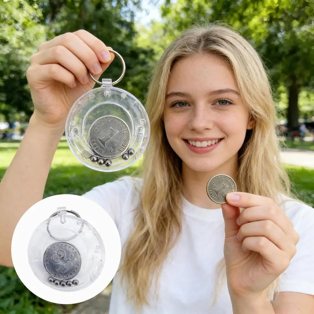 

Волшебная головоломка «Исчезающая монета»: брелок-головоломка с исчезающей монетой, портативная игрушка-трюк для начинающих, волшебное кольцо для подвешивания