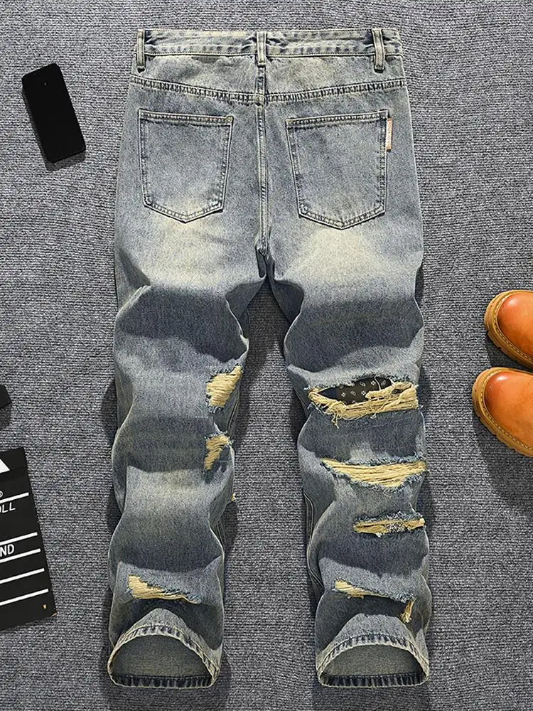 

2025 personalized handsome ripped jeans men's street fashion brand loose straight leg wide leg retro distressed denim pants