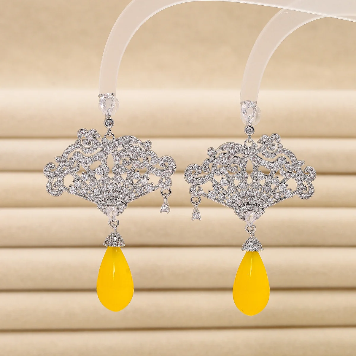 Silver Tone Fan-Shaped Filigree Drop Earrings with Yellow Teardrop Gemstone and Sparkling Rhinestone Accents