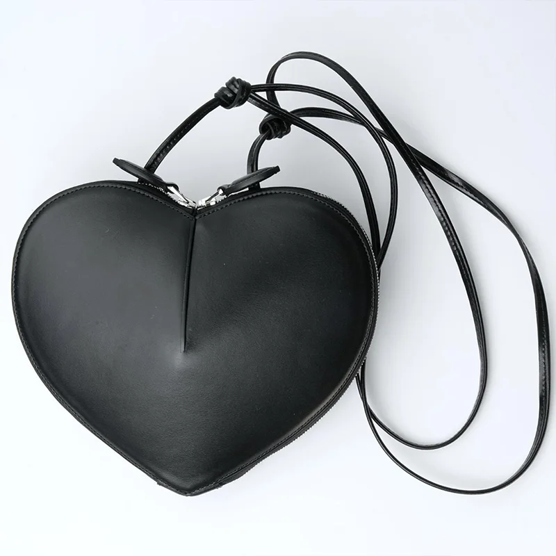 

2025 new heart-shaped genuine leather adjustable shoulder strap women's clutch small heart-shaped leather bag