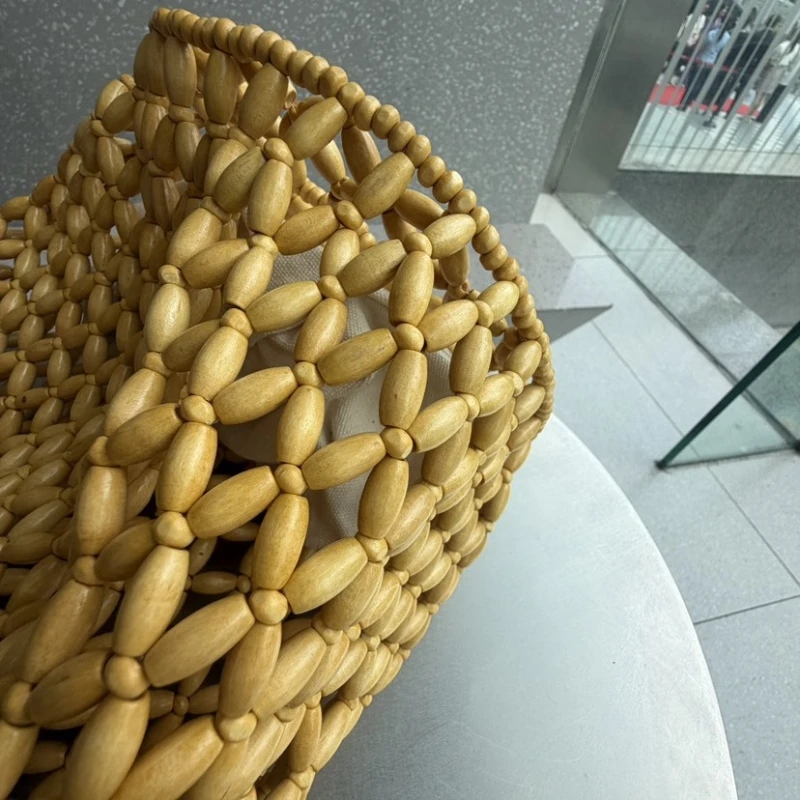 2026 New Large Capacity Wooden Bead Bag Summer Hollow Out Design Women's Handmade Wood Beaded Bamboo Handle Travel Beach Bag