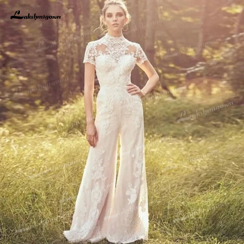 Vintage Jumpsuit Suknie ślubne Spodnie Garnitur Suknie ślubne Krótki rękaw Guzik WYSOKIE Koronkowe aplikacje Dostosowana szata soirée mariage