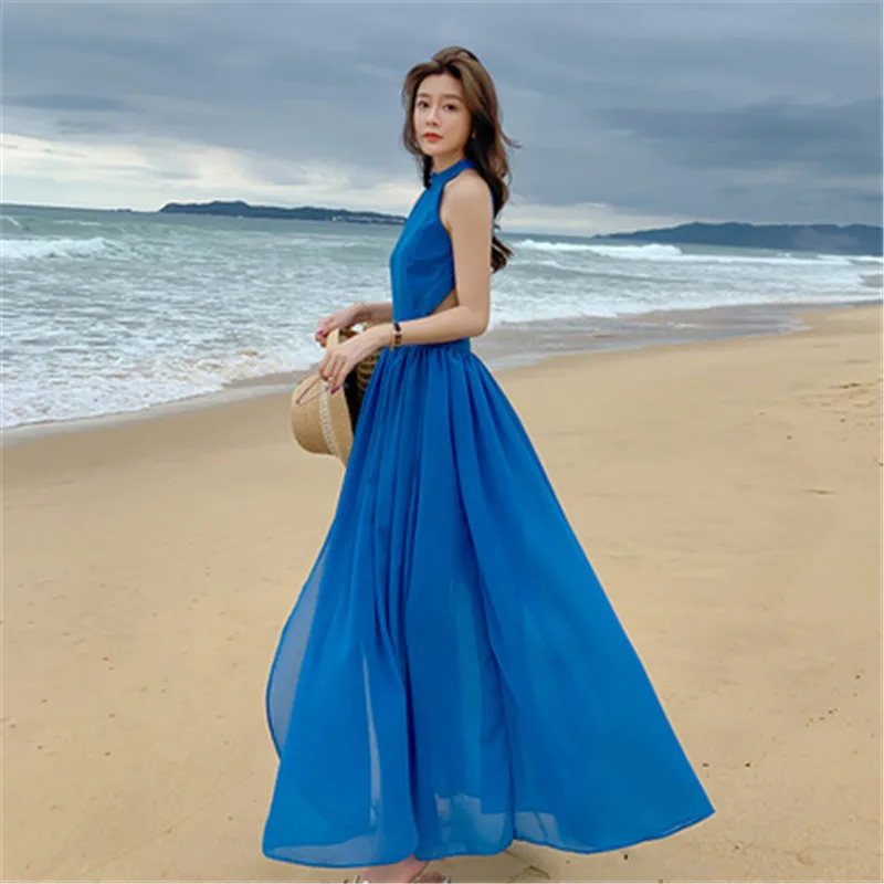 

Blue beach dress female summer seaside vacation Thailand sexy backless hanging neck solid color long swing dress