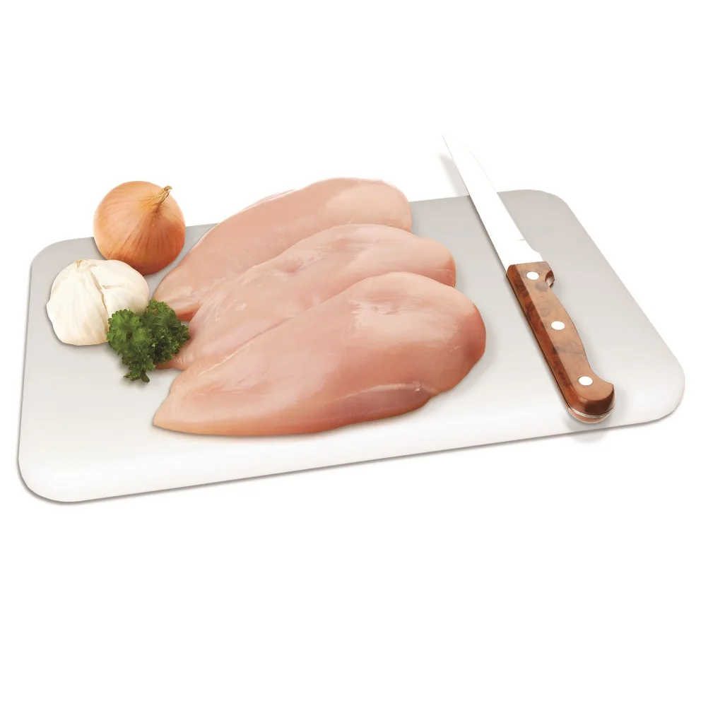 White polyethylene JOCCA cutting board for the kitchen. Quality mat, mat or board. Tool for cooking.