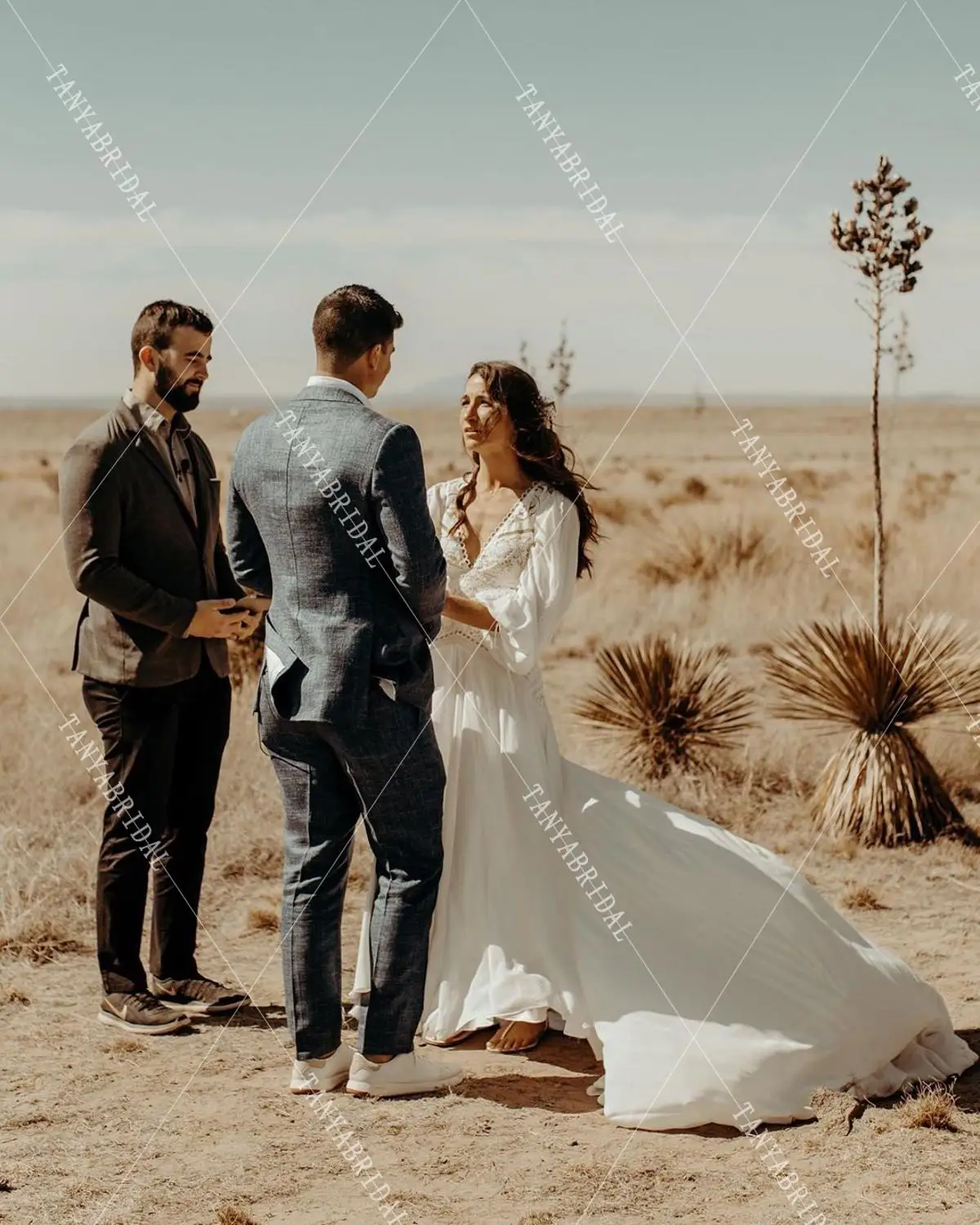 Suknie ślubne w stylu boho z długim rękawem bez pleców głęboki dekolt w serek Backless suknie ślubne Dreamy Noivas Chic Rue de soriee DW196