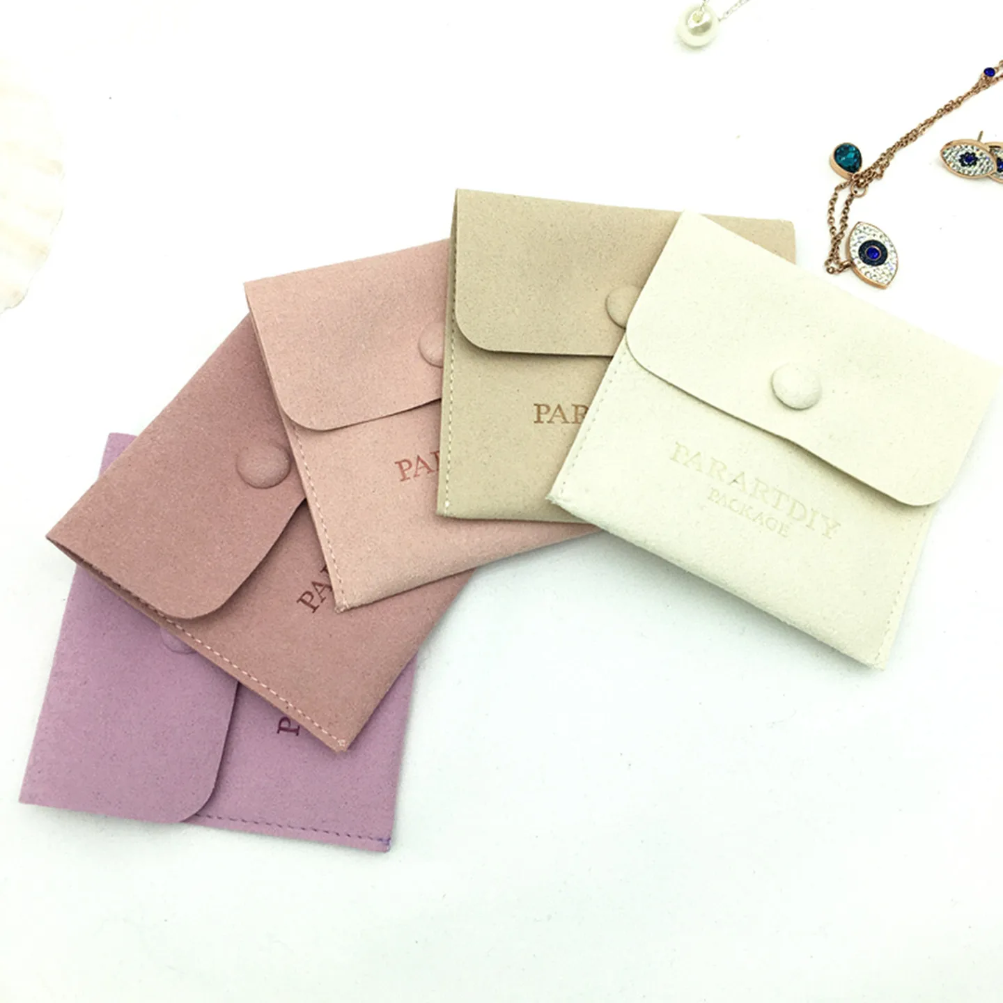 

50pcs custom jewelry package supplies personalize logo microfiber pouch bag with button necklace packaging bags logo wholesale