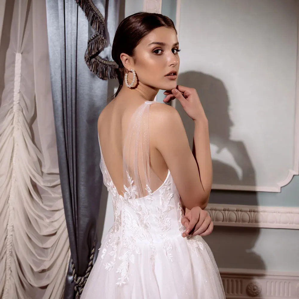 Romantic White New Wedding Dresses V Neck Sleeveless Lace Appliques Tulle Vintage Bridal Gown Sexy Backless Boho Robe De Mariee