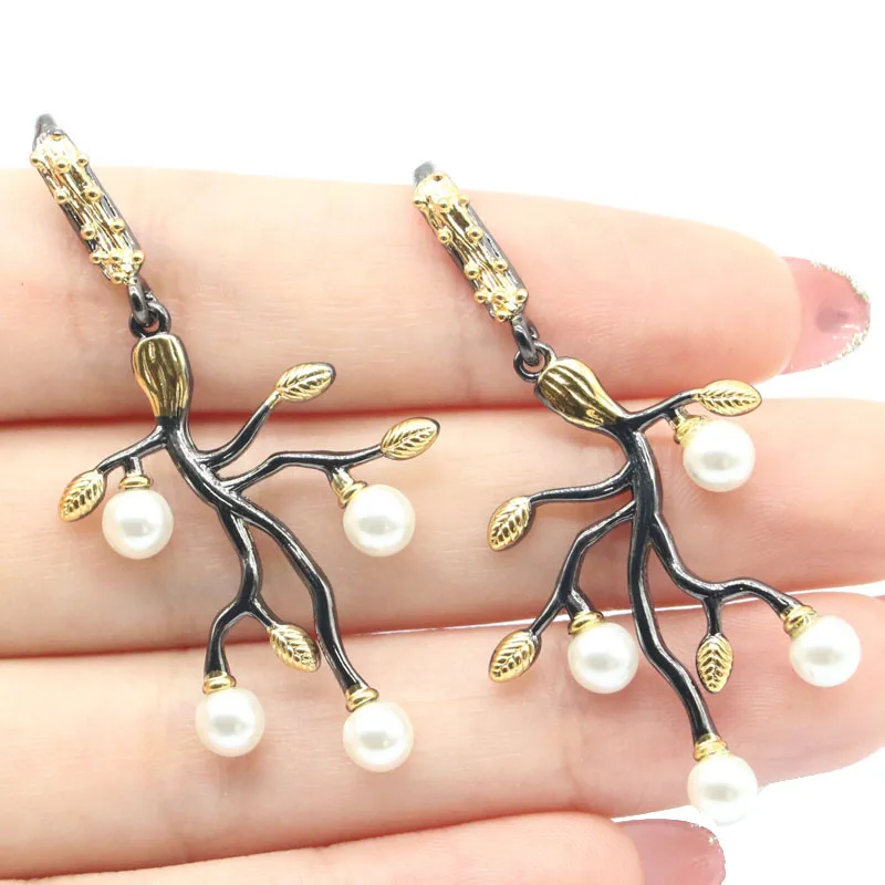 

Buy 3 Get 1 Free 51x25mm SheCrown 5.4g Vintage White Pearl Black Metal Silver Earrings Daily Punk Hollow