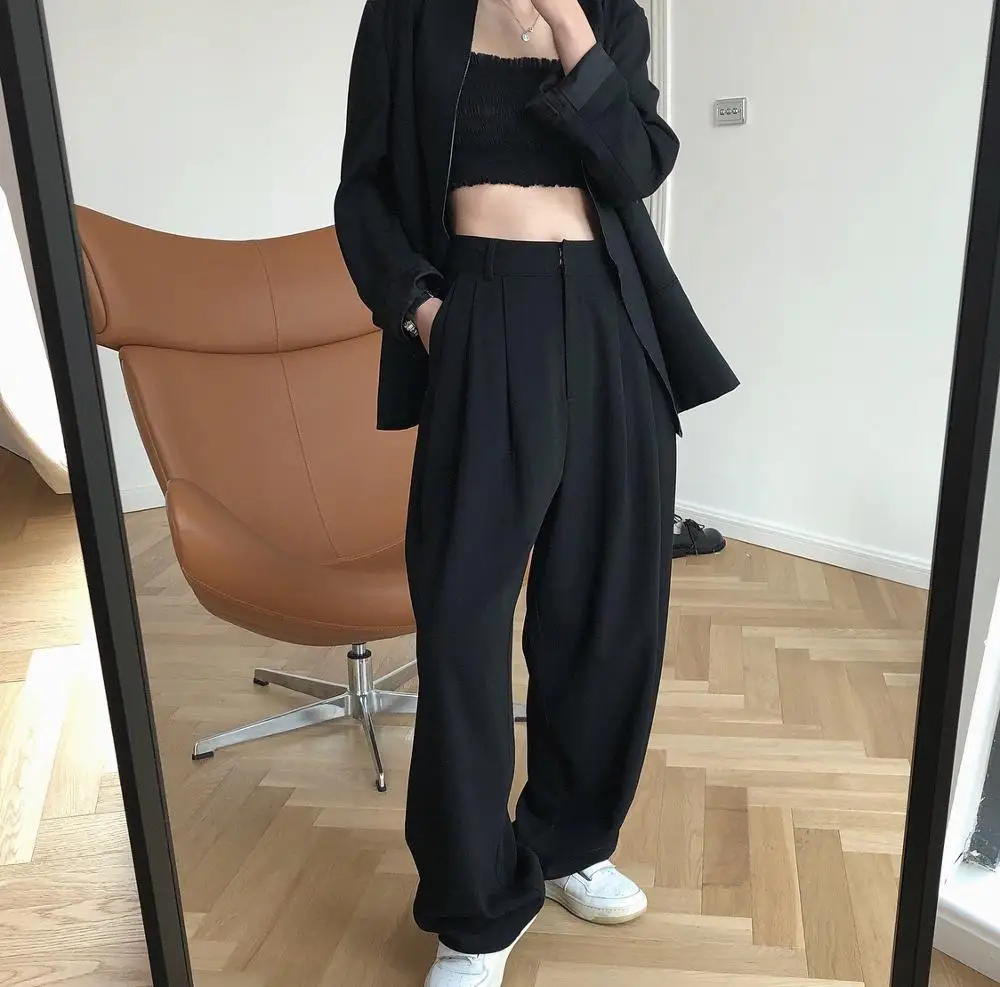 

woman classic long trousers black and jeans colors