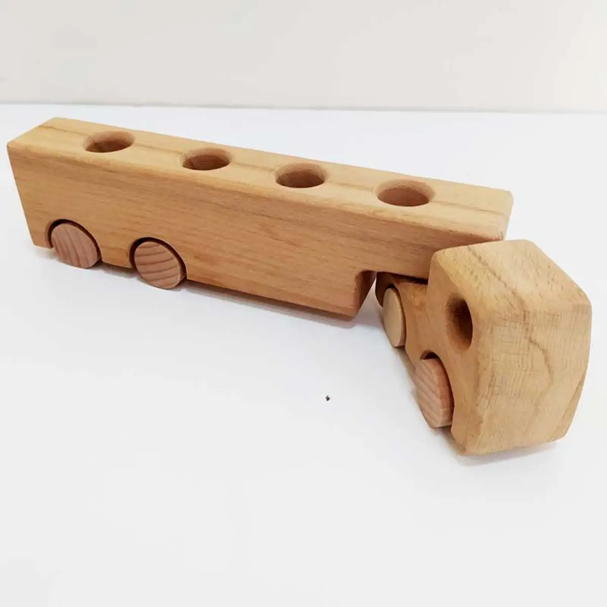 WOODEN TRUCK DRIVING TOY IS COMPLETELY HANDCRAFTED AND HARMLESS HEALTHY FOR YOUR CHILD