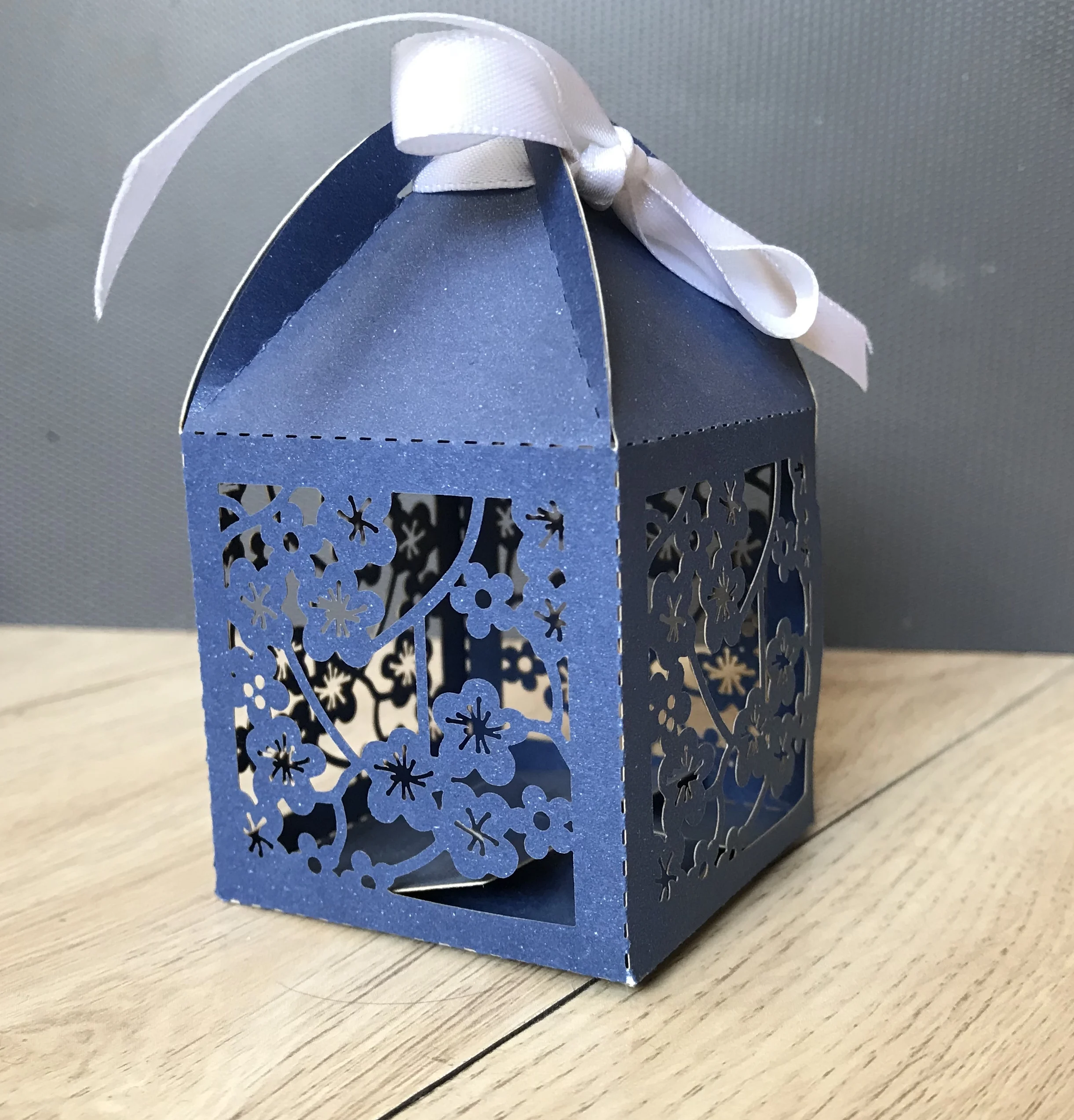 

100pcs Plum Blossom Navy Blue Laser Cut Wedding Favor Box,Small Gift Packaging Box with Ribbon, Decorated Favors for Guests