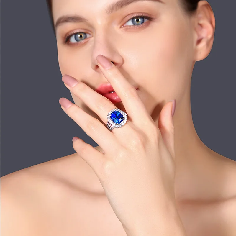 Fashion European and American large blue ring ladies fashion four-claw crystal clear green crystal. blue. Red. ring