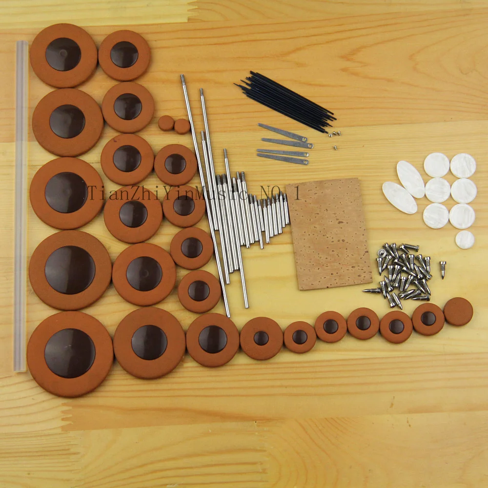 

1set=25pcs Alto Sax seal cushion sax pads Real leather Good material Sax mat+Screw