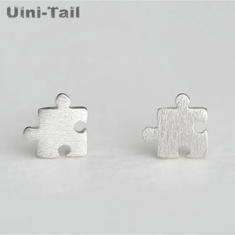 925 Tibetan silver child-friendly puzzle earrings wholesale Korean version of the simple wild cute live wave high quality ED296