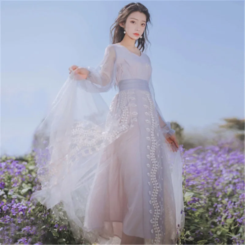 Summer new light blue heavy industry sequined mesh embroidery stitching long-sleeved V-neck temperament dress